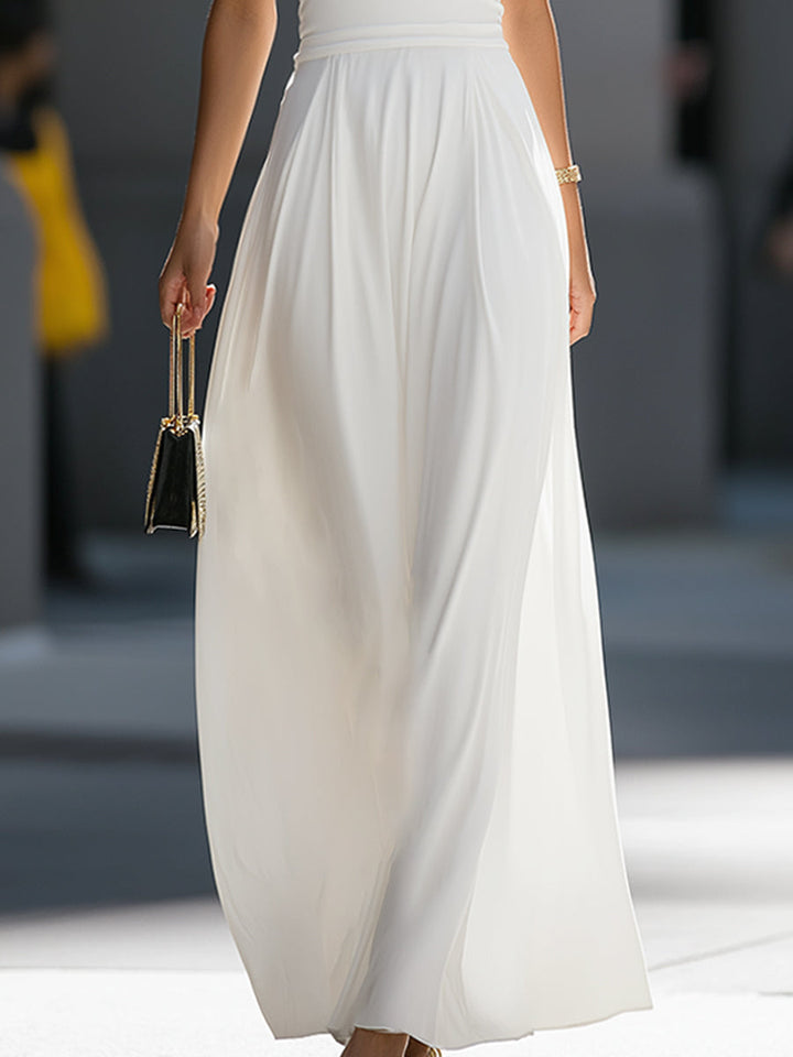 Muse & Valeur | High-Neck Halter Cutout Waist Flowing Maxi Dress