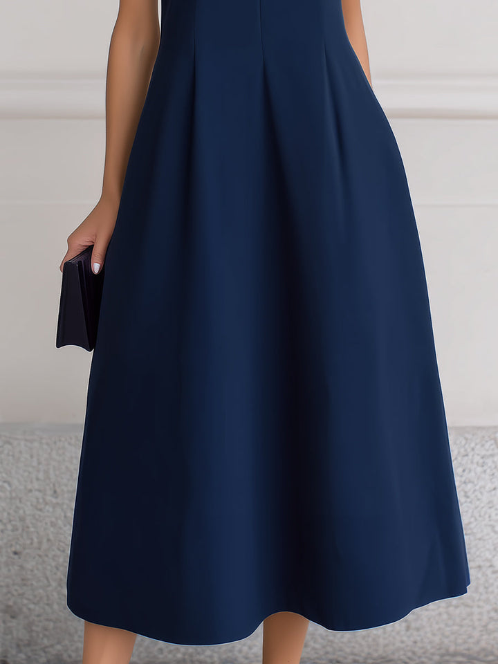 Muse & Valeur | Sleeveless Deep V-Neck Inverted Pleat A-Line Midi Dress
