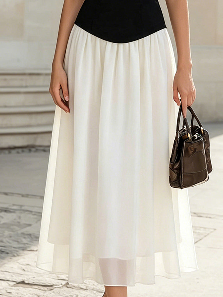 Muse & Valeur | Black & White Halter Neck Midi Dress