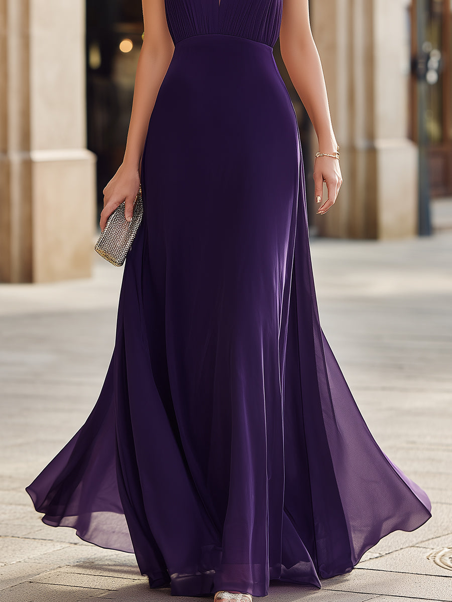 Muse & Valeur | Pleated Halter Neck Maxi Dress With Sheer Panel And Flowing Silhouette