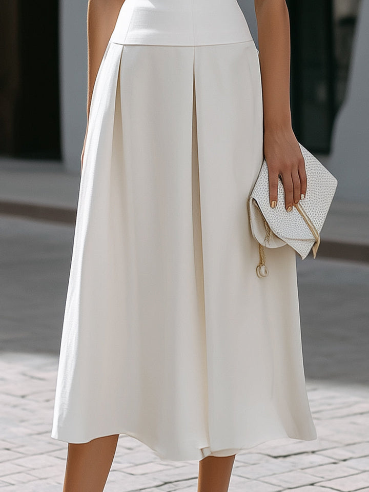 Muse & Valeur | Sleeveless Round Neck Midi Dress With Structured Waistband And Pleated Skirt