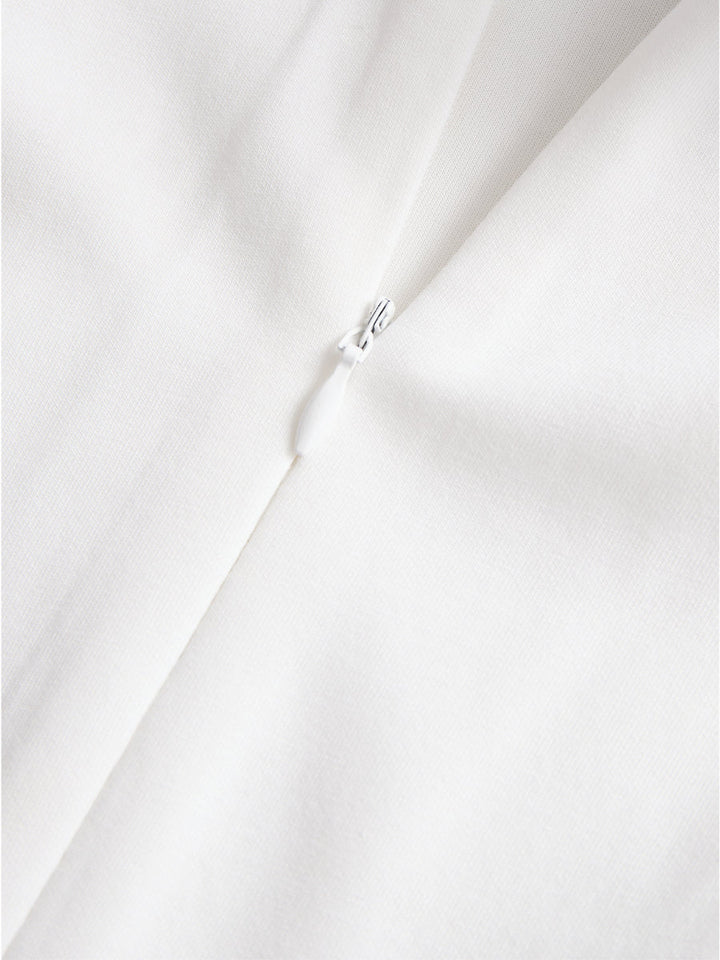 Muse & Valeur | Stylish Double-Breasted White Dress with Navy Accents