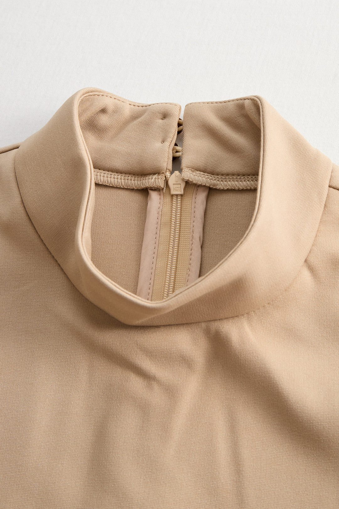 Muse & Valeur | Sophisticated Beige Belted Dress