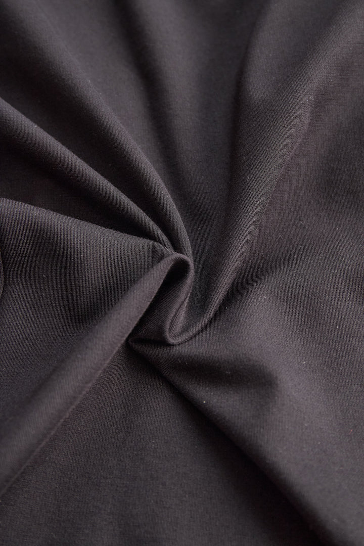 Muse & Valeur | Stylish Plain One-Shoulder Gown with Metallic Pleated